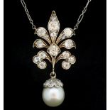 An Edwardian yellow and white gold pendant set diamonds with pearl drop, on white metal chain, 80g -