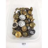 A box of military buttons
