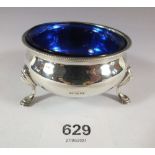 A silver salt with blue glass liner, London 1929, Goldsmiths and Silversmiths Co.