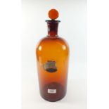 A large vintage brown glass chemists/apothecary bottle, 43cm