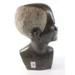 A heavy stone carved African bust sculpture of an elder, 29cm