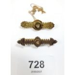 A Victorian 15 carat gold brooch set diamond and another similar on yellow metal chain