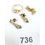 A 9 carat gold ring set diamond, size K to L, a pair of 9 carat gold earrings and a 9 carat gold