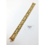 A fine quality 18 carat white and yellow woven gold bracelet set rubies and pearls, 49g