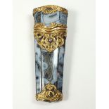 An 18th century grey agate etui mounted with gold scrollwork decoration and set diamond, the