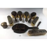Three silver and tortoishell brushes and a group of tortoiseshell brushes, mirror etc.