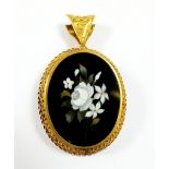 A 19th century Italian pietra dura oval locket/brooch decorated flowers, in gold mount, locket 4.2 x