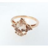 A 9ct rose gold pear form morganite ring, size O, 3.1g