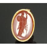 A Georgian 18 carat gold seal set cornelian carved cameo of a woman