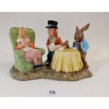 A Royal Doulton Beswick Mad Hatters Tea Party figure, limited no. 486 of 1998