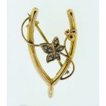 A 9ct gold horseshoe brooch set seed pearls, 1.5g