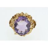 A 9ct gold ring set with amethyst in fancy mount, size H, 4.5g