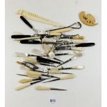 A mother of pearl and bone handled bodkins, crochet hooks, manicure items etc.