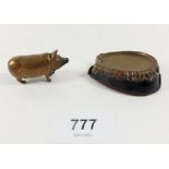 A Victorian brass novelty vesta case in the form of a pig and another in the form of a horseshoe