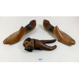 A treen dogs head novelty nutcracker and two wooden shoe lasts