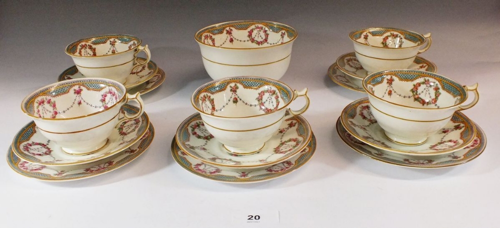 An Edwardian George Jones Crescent part tea service comprising: five cups and saucers (one