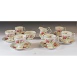 A Royal Albert 'Romance' tea set consisting six cups and saucers, sugar bowl and milk jug