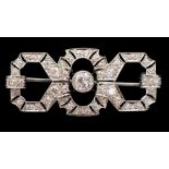 A fine Art Deco platinum brooch with three interlinked diamond set circles, the central diamond
