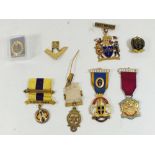 A silver and enamel Mayors badge, three Masonic Jewels and a Masonic badge