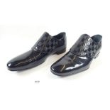 A pair of Louis Vuitton mens shoes, size 10
