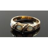 A 9ct gold ring set with 3 opals and small diamonds, size 0/N