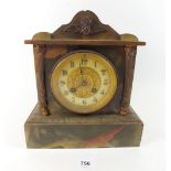 A 19th century French green marble mantel clock with striking movement, 25cm tall