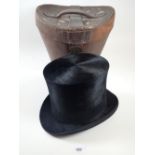 A 19thC Top Hat by A.J. White in original leather hat box