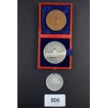 Three medallions including: Nelson 1758-1805 medal copper 38mm diameter struck from Lord Nelson's