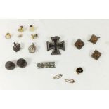 A small selection of military badges, buttons and studs, to include 1939 iron cross, 21st Punjabis