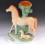 A 19thC Staffordshire figure of a Horse and Foal, 30cm