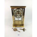 An Ansonia four glass mantel clock with visible escapement and paste surround, 27cm