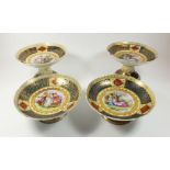 Two pairs of Austrian Vienna porcelain comports decorated with romanticised classical scenes,