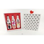 A Marc Jacobs boxed set of three Diet Coke bottles in bag with keyring