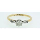 A 1920's 18 carat gold and platinum solitaire diamond ring, estimated diamond weight 0.35ct, size K,