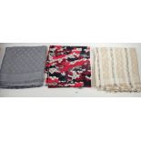 Three silk and wool Louis Vuitton scarves