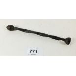 A bronze pipe tamper with flower bud terminal, 14cm