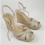 A pair of Gucci sandal wedge shoes, approx size 5-6