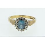 A 9ct gold cluster ring set blue zircon within white stone surround, 3.5g, size M 1/2