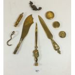 A group of brass to include whistle, paperknives etc.
