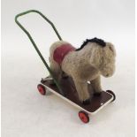 A 1940's/50's child's donkey walker by Chiltern toys with original label