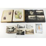 Postcards: A Victorian embossed leather photograph album containing family portraits etc. Kodak