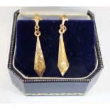 A pair of 9ct gold earrings