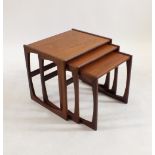 A nest of three G-Plan teak occasional tables