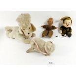 A vintage soft toy clockwork musical poodle, a clockwork cat - boxed, a Walt Disney Mickey Mouse and
