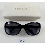 A pair of ladies Versace sunglasses, cased