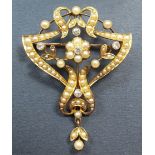 An Art Nouveau 15 carat gold diamond and seed pearl brooch with safety chain, 4.5cm length, 7.2g