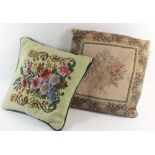 A vintage tapestry cushion and another cushion