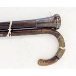 A silver topped ebony walking stick and a silver collared walking stick a/f
