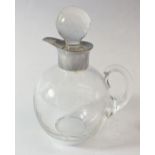 A glass liquor decanter and stopper etched bird and foliage design with silver '925' rim, stamped HB