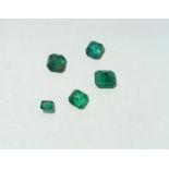 A group of 2.2 carats of cushion cut emeralds